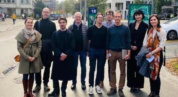 Group of people in front of a modern building