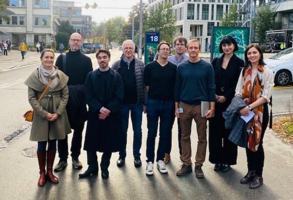 Group of people in front of a modern building